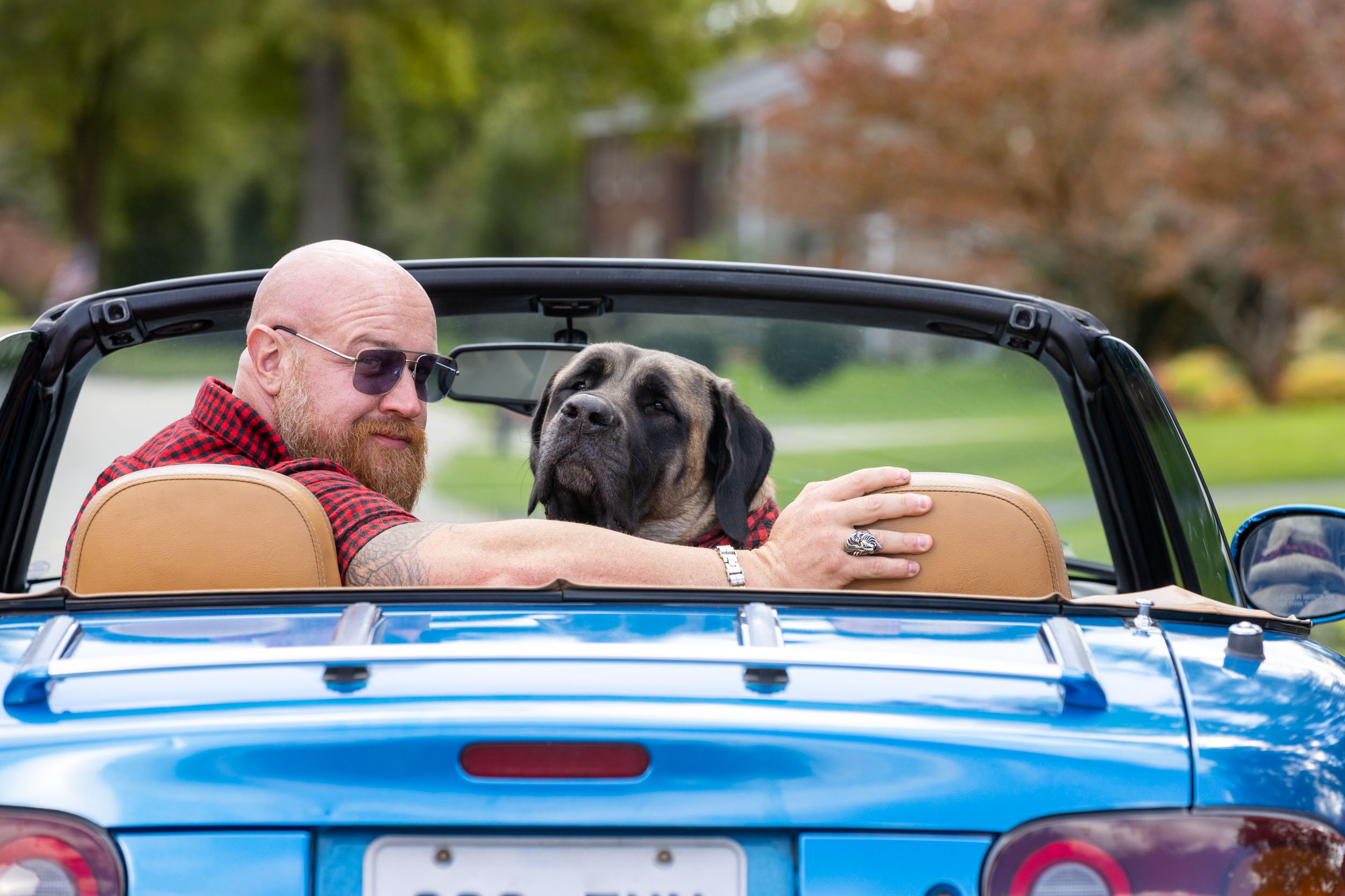 Pet Lifestyle Photography | Man and Dog in Convertible by Mark Rogers