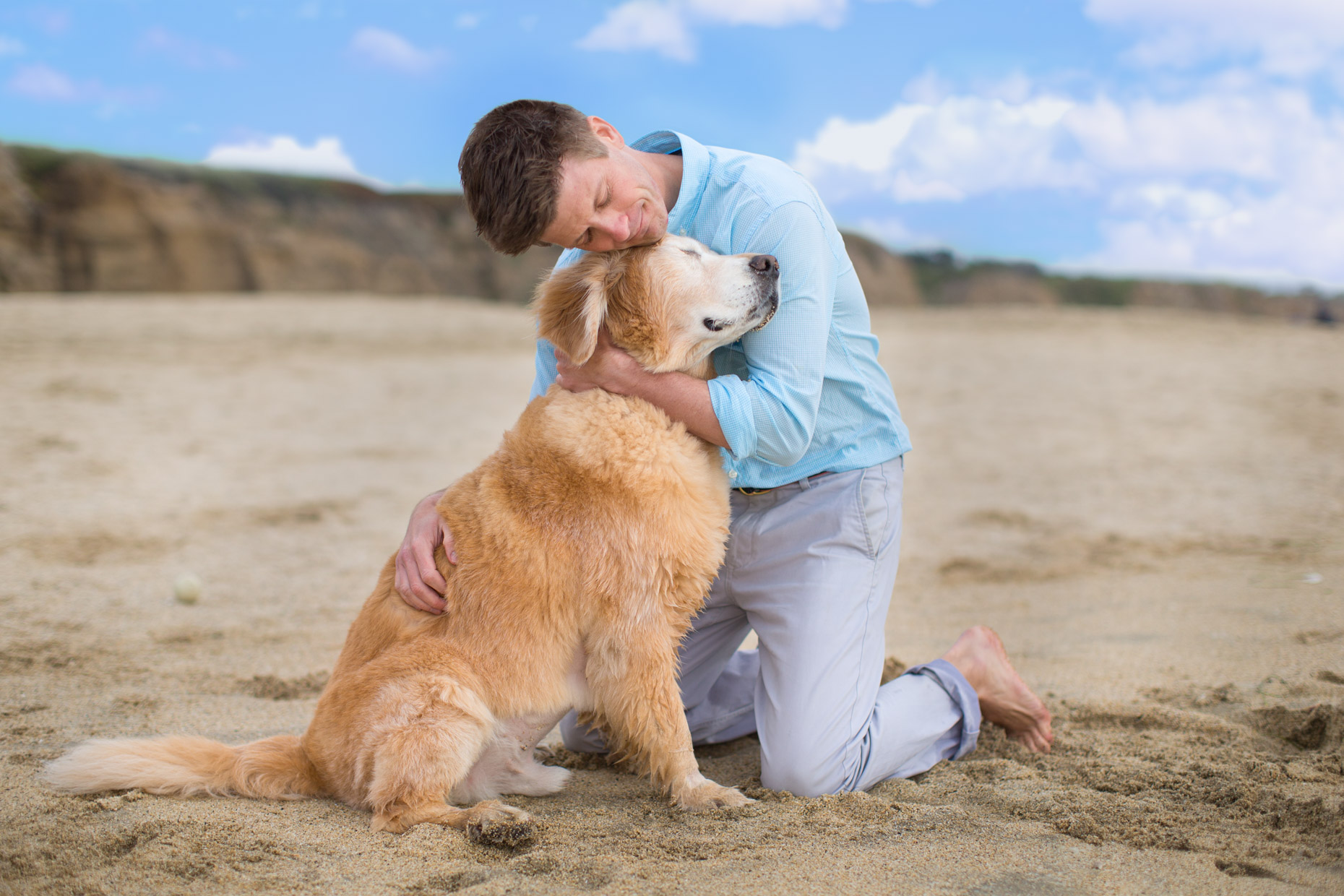 Pet and People Photography | Man Holding Senior Dog by Mark Rogers